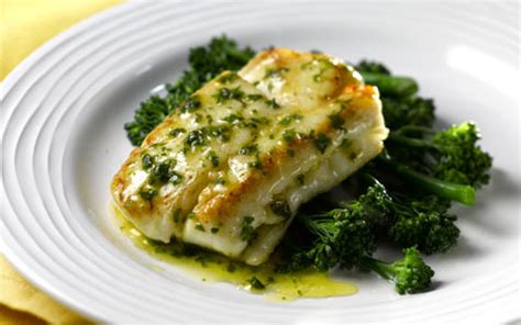 pan-fried-hake-with-lemon-and-herb-butter-sauce image