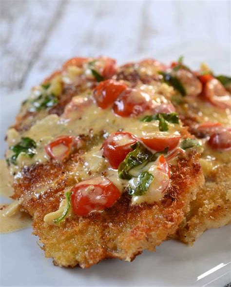parmesan-crusted-tilapia-with-tomato-basil-cream-sauce image