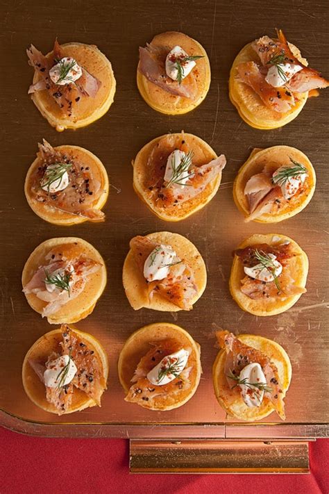 smoked-trout-blinis-with-crme-frache-and-dill-saveur image