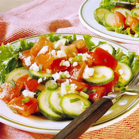 tomato-and-zucchini-salad-better-homes-gardens image