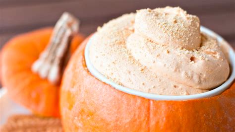 17-halloween-dip-ideas-you-can-serve-in-a-pumpkin image