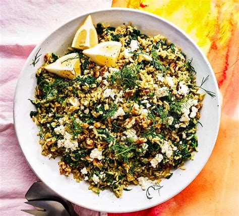 greek-spinach-rice-with-feta-recipe-bbc-good-food image