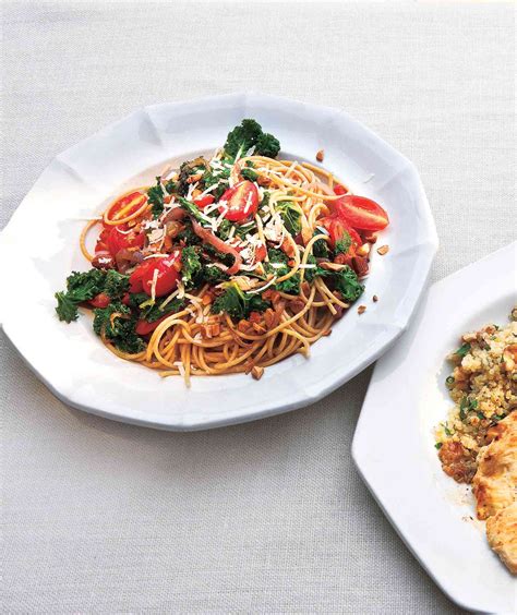 whole-grain-spaghetti-with-kale-and-tomatoes image