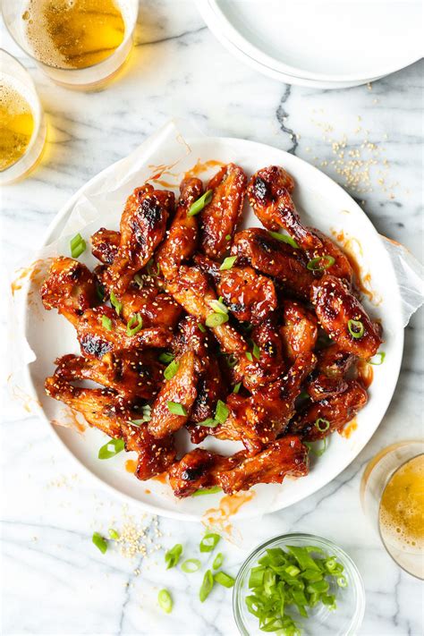 sticky-asian-chicken-wings-damn-delicious image