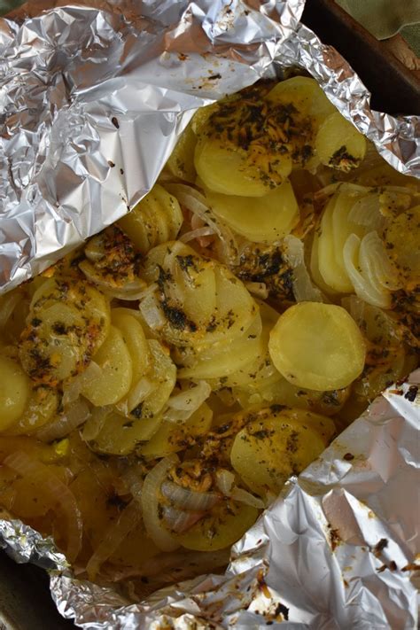 campfire-potatoes-recipe-in-a-foil-packet-with-cheese image