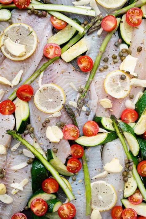 oven-baked-tilapia-with-zucchini-and-asparagus image