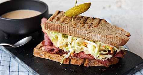 reuben-sandwich-with-pastrami-and-coleslaw image
