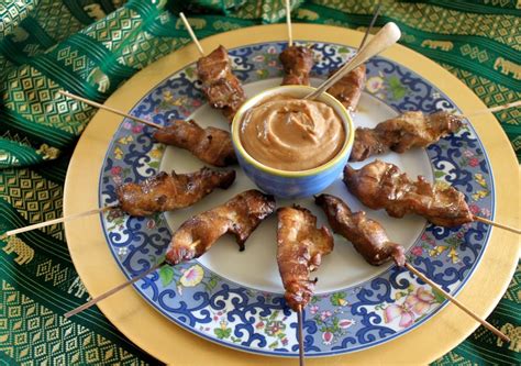 singapore-chicken-satay-skewers-with-peanut-sauce image