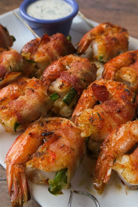 bacon-wrapped-shrimp-stuffed-with-jalapeos-cheese image