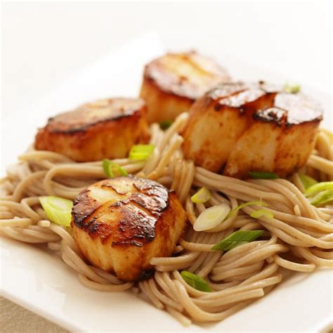 miso-glazed-scallops-with-soba-noodles-eatingwell image