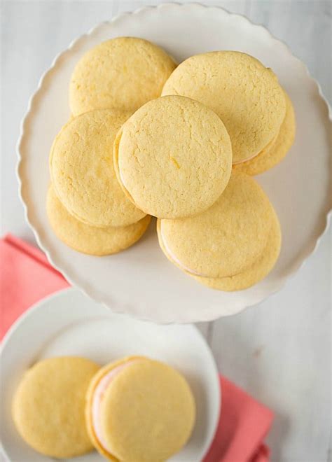 pink-grapefruit-sandwich-cookies-brown-eyed-baker image