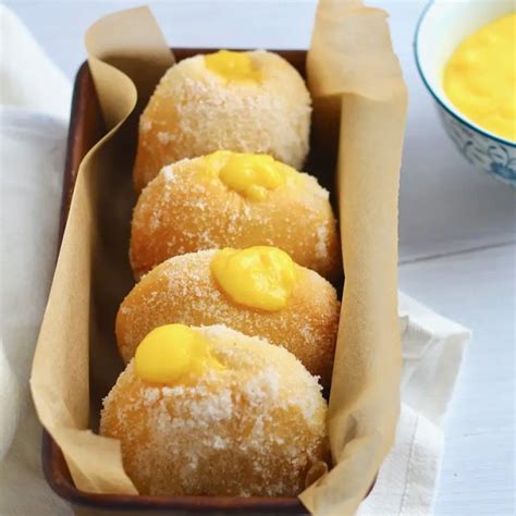 baked-lemon-curd-filled-donuts-island-bakes image