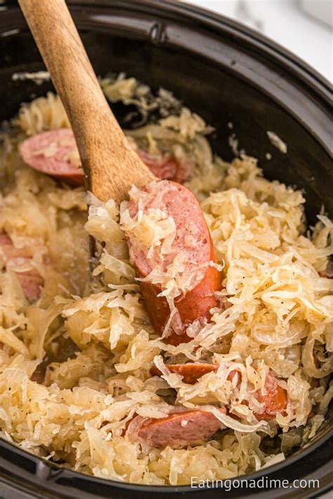 slow-cooker-kielbasa-and-sauerkraut-eating-on-a image
