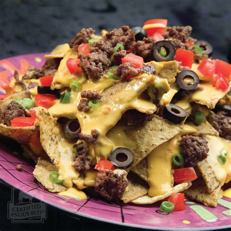 cheesy-loaded-beefy-nachos-wishes-and-dishes image