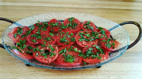 sliced-tomatoes-with-fresh-basil-farm-girl-fresh image