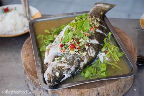 thai-steamed-fish-with-lime-and-garlic-ปลากะพงนงมะนาว image