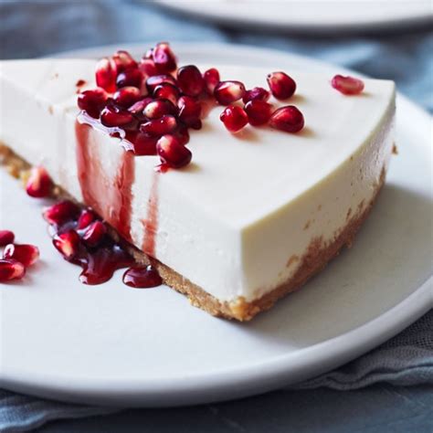 greek-yogurt-cheesecake-with-pomegranate-syrup image