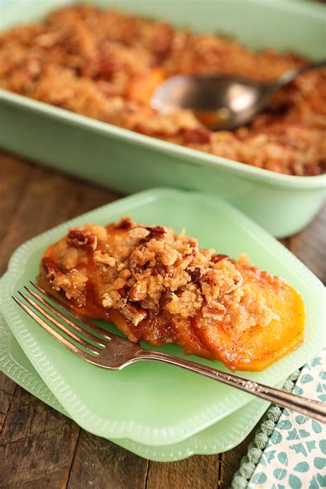 candied-sweet-potatoes-with-pecans-southern-bite image