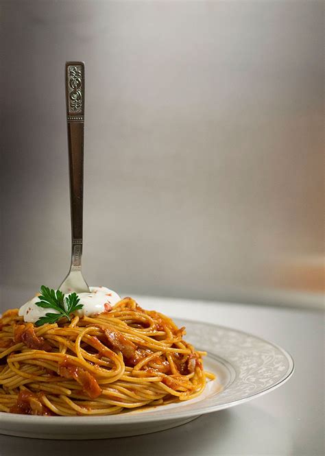 italian-spaghetti-with-simple-tomato-bacon-sauce image