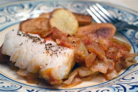 steamed-cod-with-cabbage-in-a-spanish-tomato image