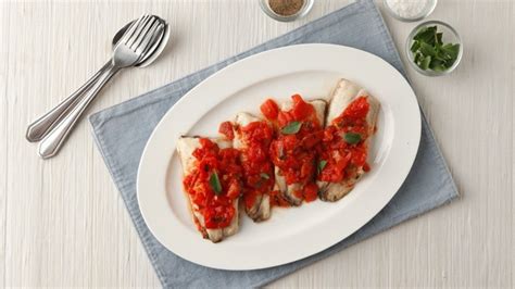 baked-tilapia-fillets-with-tomatoes-recipe-yummyph image