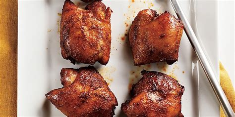 spicy-honey-brushed-chicken-thighs-recipe-myrecipes image