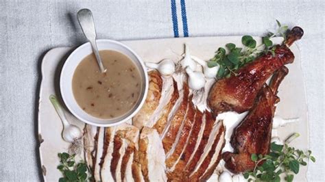 salted-roast-turkey-with-herbs-and-shallot-dijon-gravy image