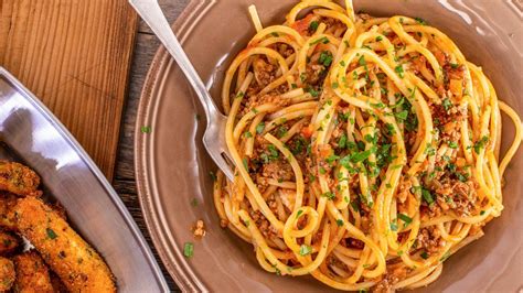 rachaels-three-meat-bolognese-sauce-rachael-ray image