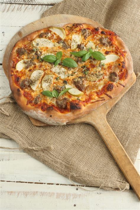 homemade-pizza-dough-recipe-a-farmgirls-kitchen image