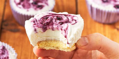 best-lemon-blueberry-mini-cheesecakes-recipe-delish image