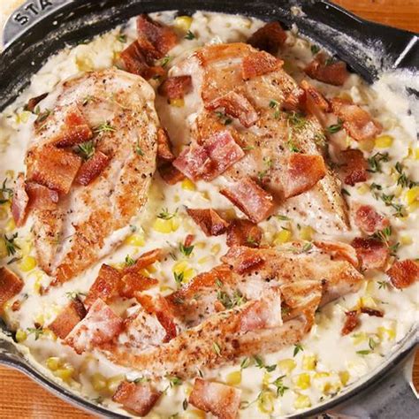 best-garlicky-creamed-corn-chicken-recipe-delish image