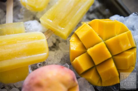 peach-mango-lemonade-popsicles-tried-and-tasty image