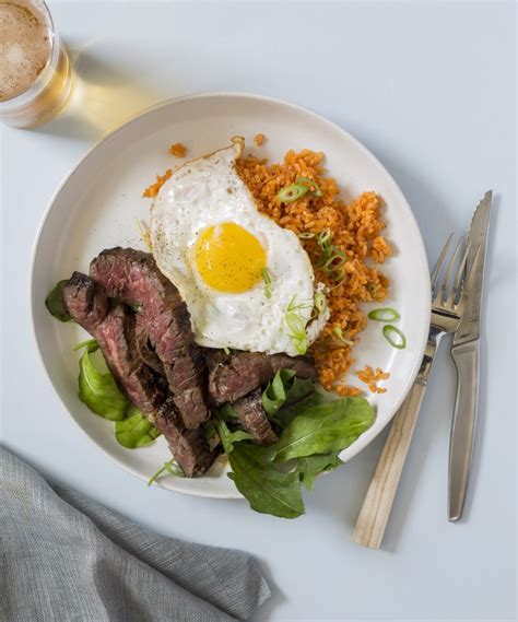 korean-style-steak-and-eggs-with-kimchi-fried-rice image