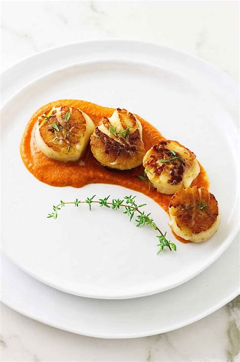 seared-scallops-with-romesco-sauce-savor-the-best image