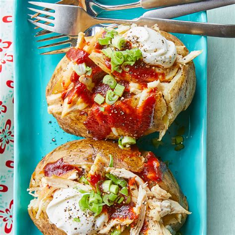 barbecue-chicken-stuffed-baked-potatoes-eatingwell image