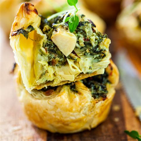 cheesy-spinach-artichoke-puffs-simply-delicious image