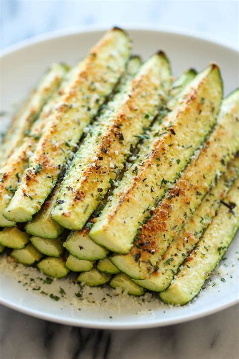 baked-parmesan-zucchini-recipe-damn-delicious image