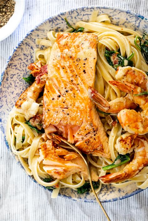 creamy-tuscan-salmon-shrimp-pasta-simply-delicious image
