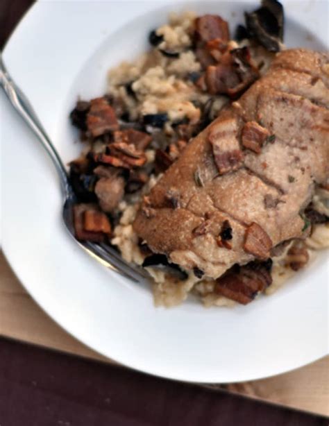 recipe-duck-with-black-olives-and-black-olive-risotto image