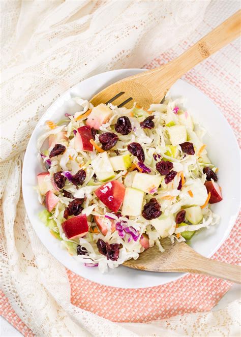 apple-cranberry-almond-coleslaw-salad-recipe-no-mayo image