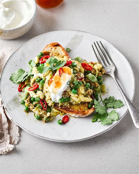curried-eggs-on-toast-recipe-delicious-magazine image