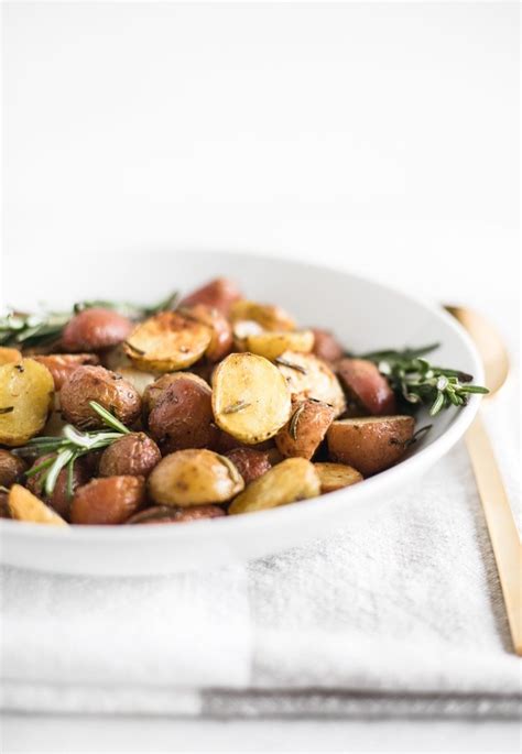 simple-oven-roasted-rosemary-potatoes-lively-table image