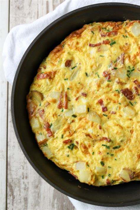 danish-egg-cake-with-potatoes-bacon-and-chives image