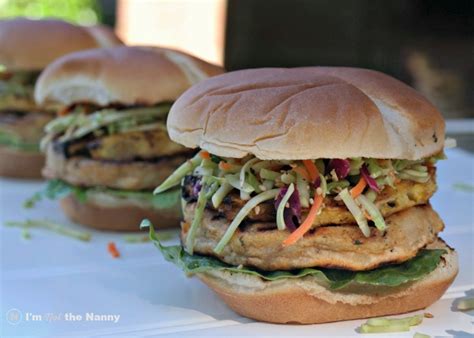 fish-burgers-with-grilled-pineapple-sesame-slaw image