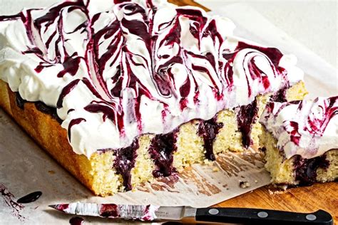 how-to-make-a-blueberry-poke-cake-from-scratch-the image