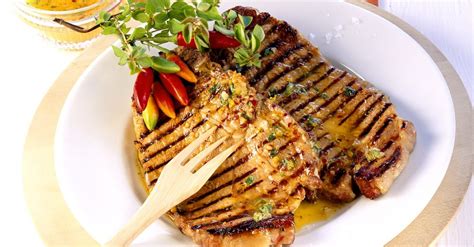 orange-marinated-grilled-pork-chops-recipe-eat image
