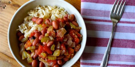 savory-slow-cooker-beans-with-rice-the-beachbody-blog image