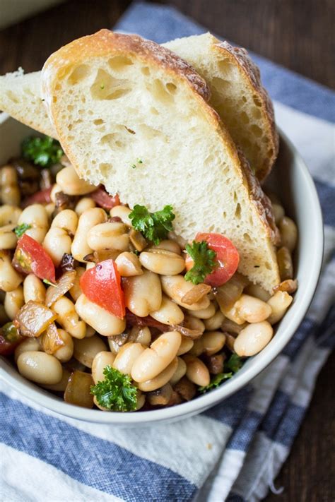 tuscan-white-bean-salad-recipe-the-wanderlust image