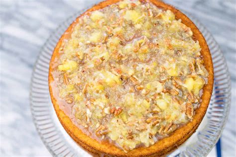 seven-up-cake-with-pineapple-coconut-pecan-filling image