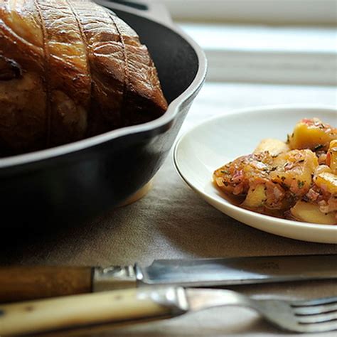 pork-roast-brined-in-rum-and-cider-with-apples image